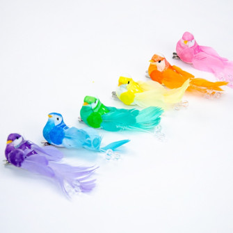 Colored birds with beads in a pack