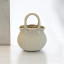 Ceramic vase-purse "Cream Stripe"