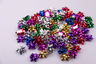 Star bows 4 cm colored metal 100 pcs.