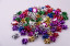 Star bows 4 cm colored metal 100 pcs.