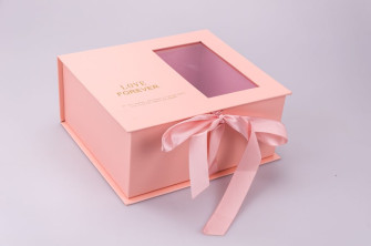 Box of flowers and macaroon peach
