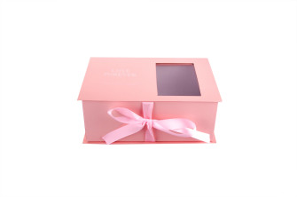 Box of flowers and macaroon peach